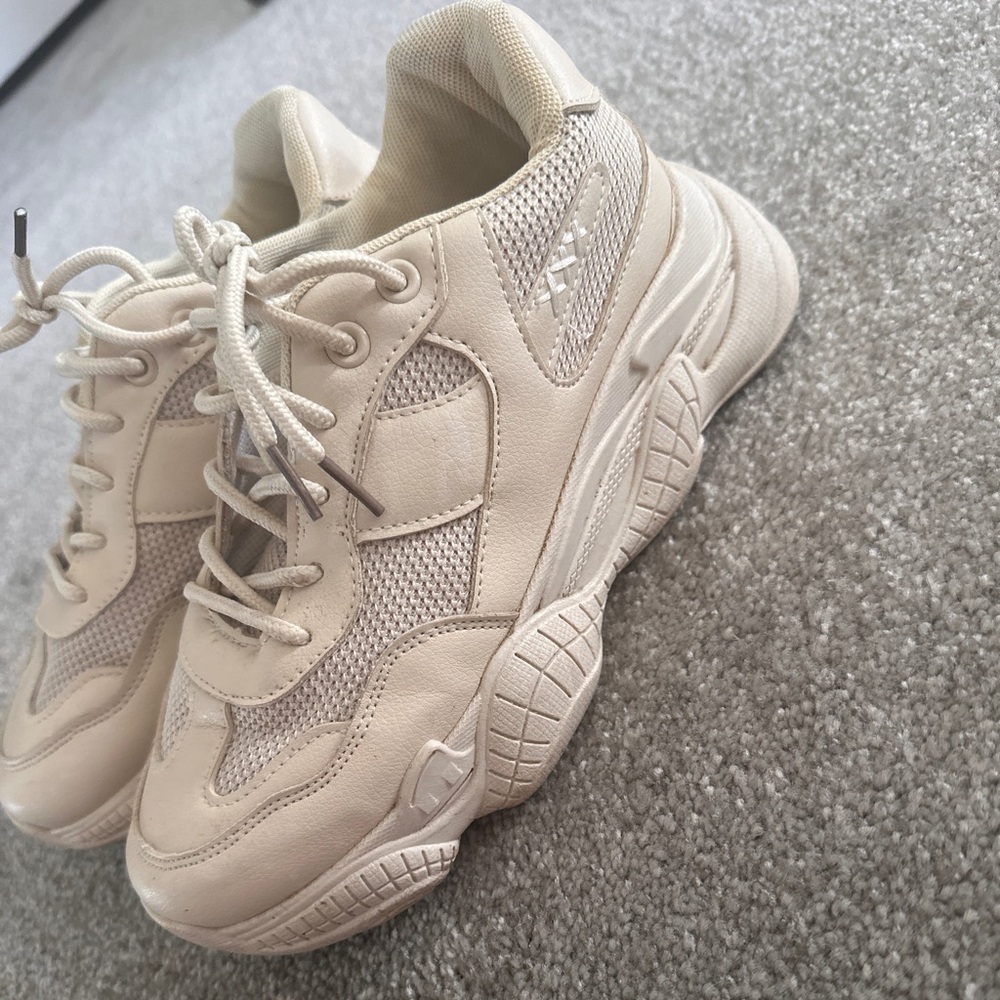 Tan sneakers with chunky platform